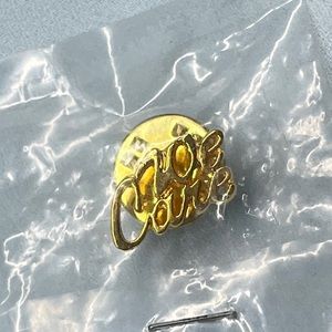 “We Care” Gold Pin